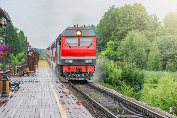 Passenger train approaches to the platform.