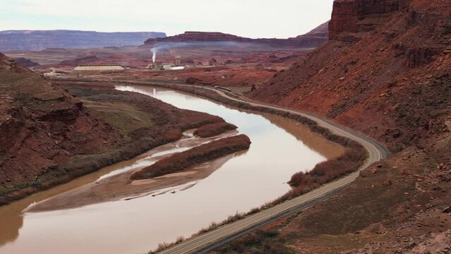 Moab, Utah, where the landscape has been carved by the Colorado River Erosion, looking at the Red Mudded Colorado River Landscape and the Potash Mine Operation