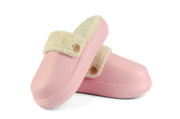 A pair of warm slippers with fur on a white background, isolate