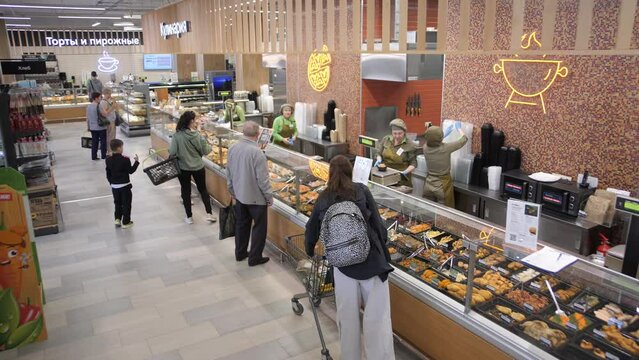 Live line in the prepared foods department of a large supermarket food store. Timelapse