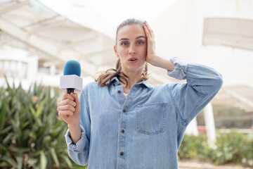 feeling extremely shocked and surprised. presenter with a microphone concept