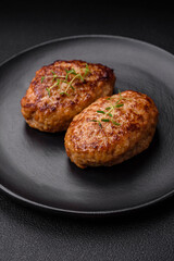 Delicious fresh fried minced fish cutlets with spices and herbs