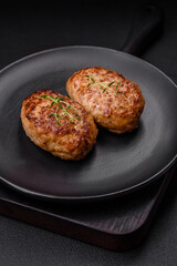 Delicious fresh fried minced fish cutlets with spices and herbs