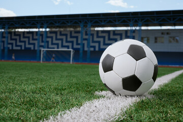 soccer ball in the center of the field at the start of the game