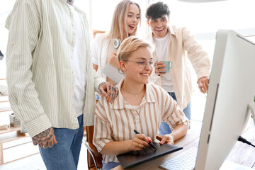 Obraz premium Team of graphic designers working in office