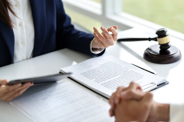 Lawyer discuss the contract and legal document agreement in office. Law and legal concept.