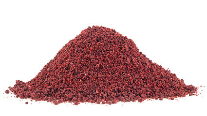 Dry ground sumac spice isolated on a white background, front view.