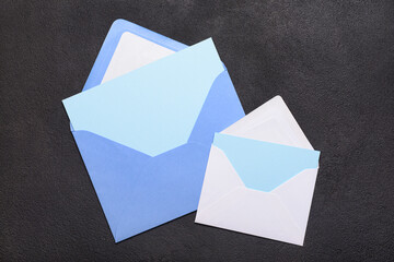 Envelopes with blank cards on dark background