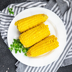 cob corn boiled corn ready to eat cooked vegetable healthy meal food snack on the table copy space food background rustic top view