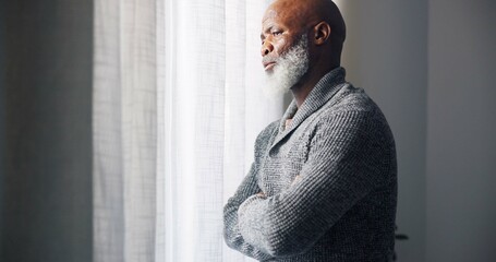 Depressed, sad and senior man in home with mourning and memory with mental health problem. Elderly male person, sorry and anxiety in a house feeling disappointed in retirement with grief and fail