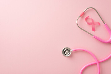 Obraz na płótnie Canvas Plan your health check month. Top view flat lay composition with stethoscope and pink ribbon on soft pink surface, excellent for medical awareness messages