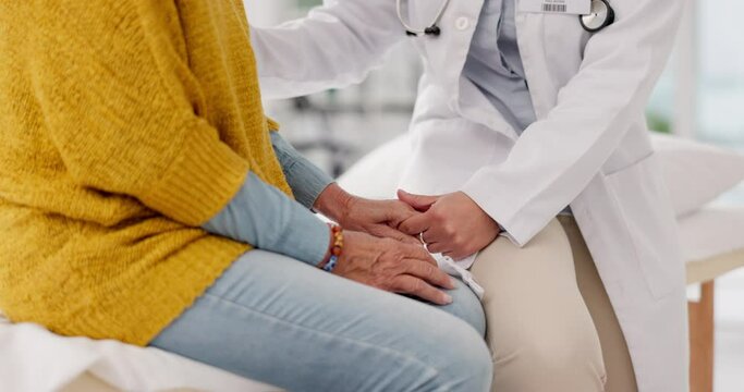 Holding hands, support or doctor with patient in consultation for healthcare advice or checkup at hospital. Closeup, cancer therapy or medical worker talking to person in appointment for medicare