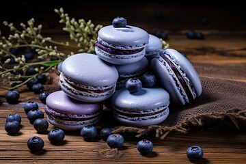 Fototapeta na wymiar Purple macarons dessert with blueberry on wooden background