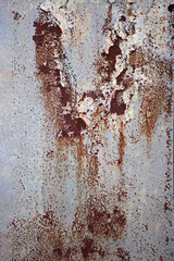 A grunge metal surface with decay and rust