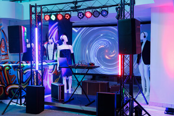 Dj equipment on stage for electronic music live performance in nightclub. Musician controller for...