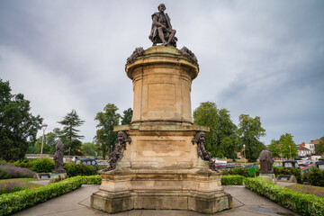 Fototapeta na wymiar William Shakespeare statue at dawn in Stratford Upon Avon, Warwickshire, England, the writer's birthplace