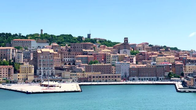 Vast azure sea with city skyline and a port. Ancona