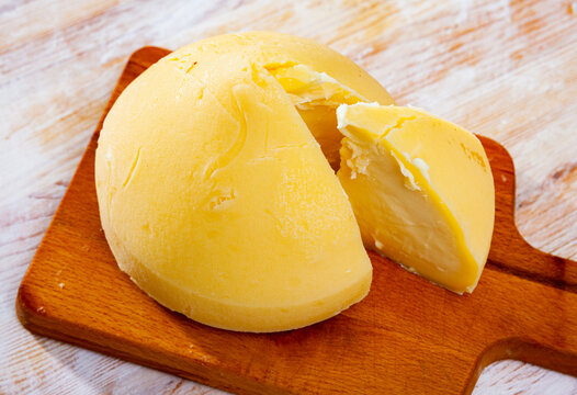 Traditional Galician semi-hard cheese Tetilla from cow milk with rich aroma and delicate flavor. Usually served as dessert