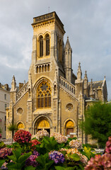 View of impressive Catholic Sainte-Eugenie church in Biarritz, Pays Basque, France - obrazy, fototapety, plakaty