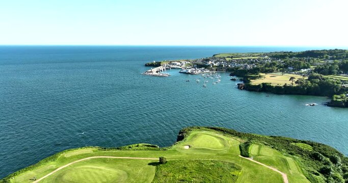 Incredible golf course on a rocky bluff near the ocean 4k