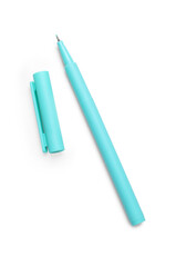 One turquoise marker and cap on white background, top view