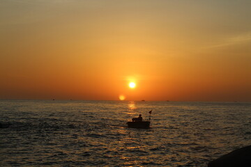 boat at sunrise