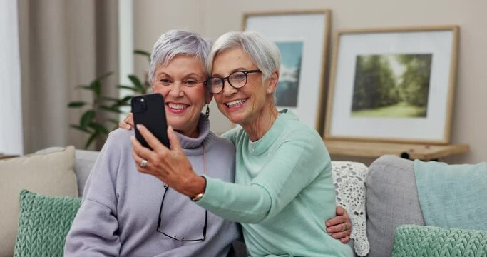 Happy senior woman, friends and selfie for photograph, memory or picture together on living room sofa at home. Elderly women smile for photo, friendship or social media in retirement or old age