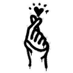 Spray Painted Graffiti Korean heart sign Sprayed isolated with a white background. graffiti Finger love symbol with over spray in black over white.