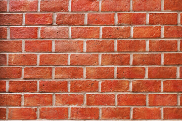 wide view of red brick wall construction