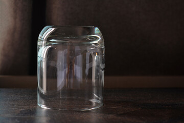 A glass of water is an empty glass of water placed on the floor.