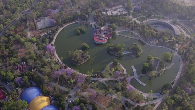 Aerial birds eye view beautiful lake and park in Bosque de Chapultepec. Biggest park in Mexico City and one of the biggest city parks in the world.