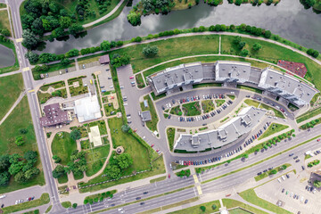 aerial drone view of residential houses located near a river. viewpoint from above.