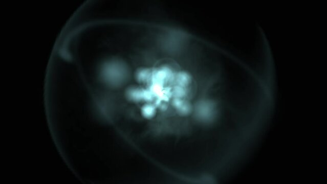 Particle physics atomic nucleus simulation with slow zoom out.