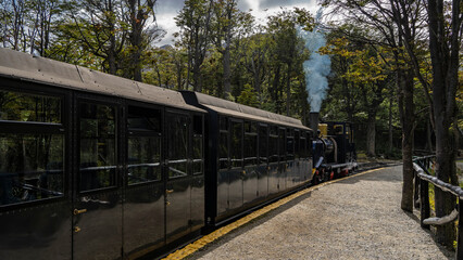 An ancient tren Fin del Mundo on a historic narrow gauge railway in Tierra del Fuego National Park....