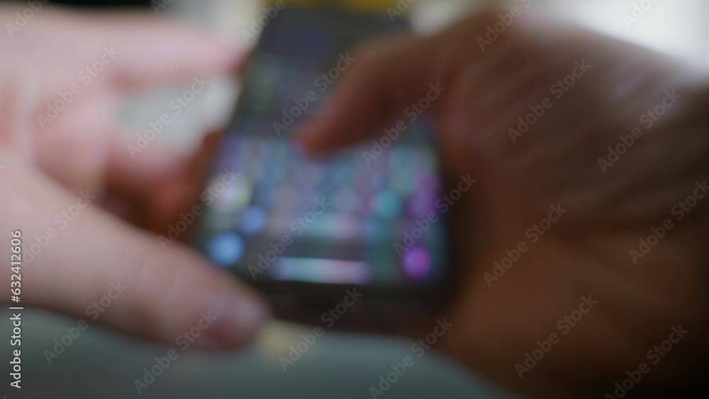 Aufkleber blurry close-up view of caucasian hands using smartphone to send text message
