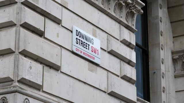 Downing Street, City of Westminster Street Sign on Building Close Up