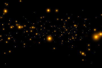 Fototapeta na wymiar Golden fireflies floating in the dark