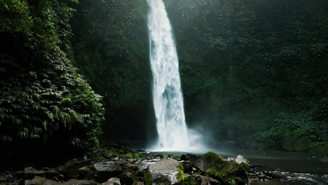 Dreamy waterfall in deep jungle of Bali