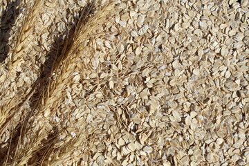 Texture from dry cereals of oatmeal with ears.