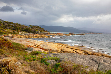 Fototapeta na wymiar Tasmania rocky coastline at Bicheno on the east coast,Australia