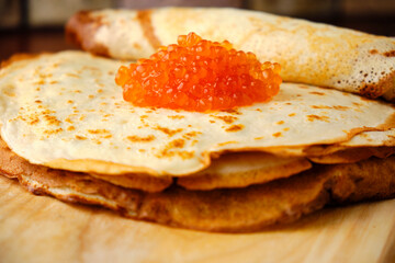 red caviar and pancakes