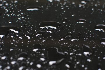 rain raindrops on the floor of car paint.
