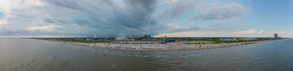 Aerial panorama Galveston Beach Texas with afternoon storms rolling in from the north