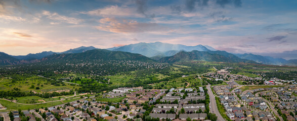 Aerial panorama Colorado Springs neighborhoods by the Rocky Mountains