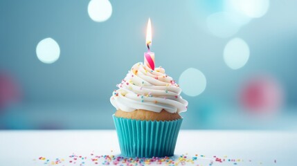 Delicious birthday cupcake on table on light background, copy space, high quality