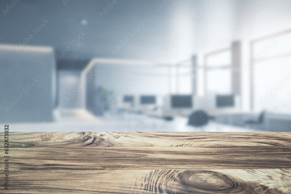 Poster close up of empty wooden desktop with product placement mock up place on blurry office interior back
