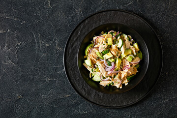 tuna salad with avocado, onion, cucumber, capers