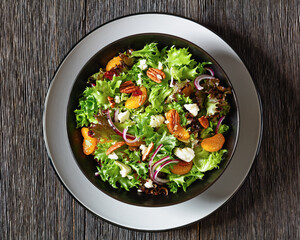 Mandarin Orange Salad in black bowl, top view