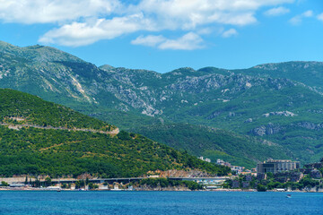 Fototapeta na wymiar beautiful views of boats and the sea, mountains, tourism and summer travel, Montenegro, Adriatic Sea