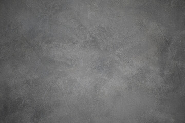 The white concrete wall has stains and cracks texture.